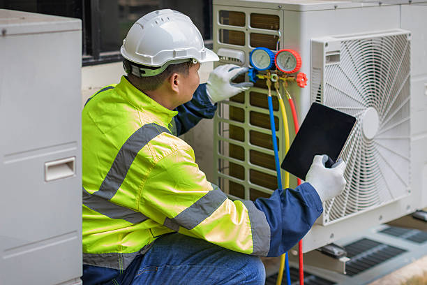 Professional Hvac technician working in Groton, MA